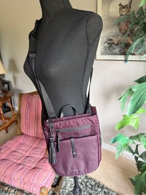 Sherpani Plum Travel Crossbody with Tassel Accent